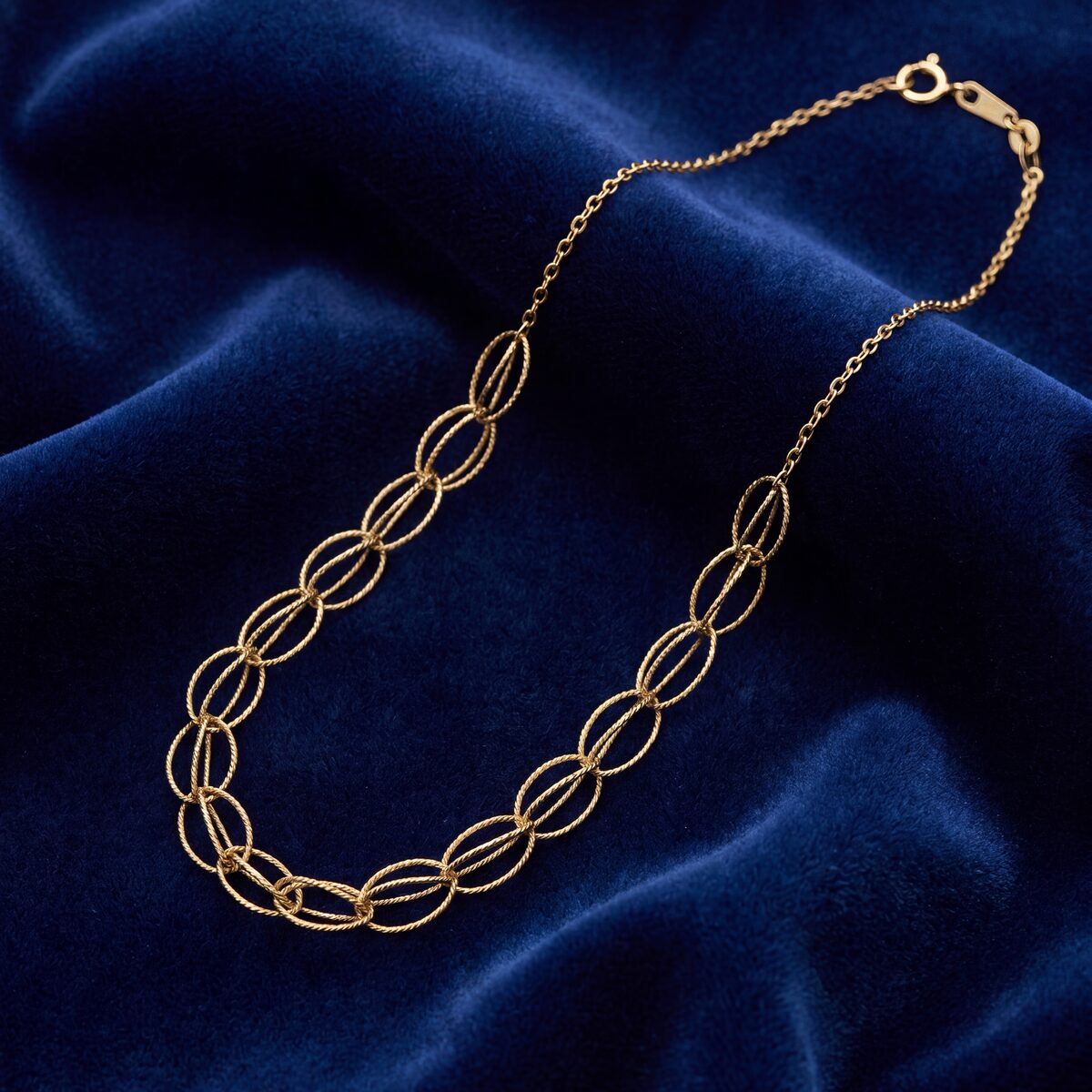 Oval Looped Link Necklace And Bracelet Set — photograph 1