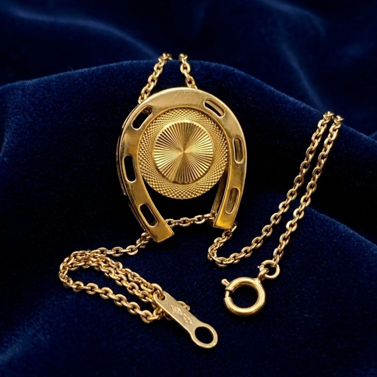 Gold Horseshoe Illusion Pendant — photograph 1