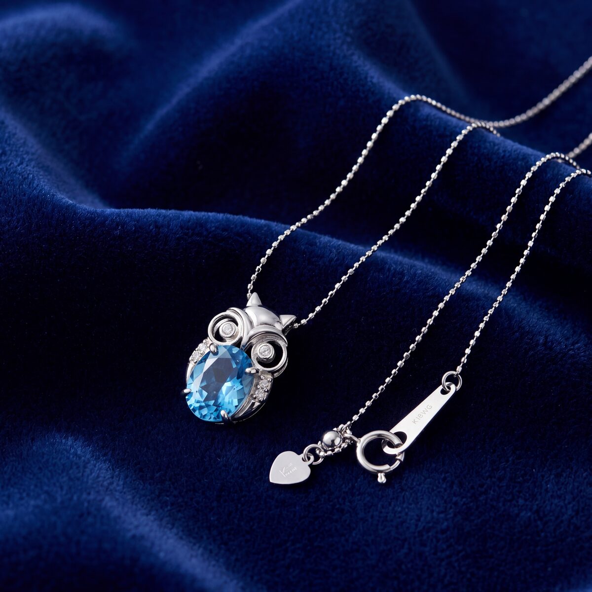 Blue Topaz Diamond Owl Pendant — photograph 1