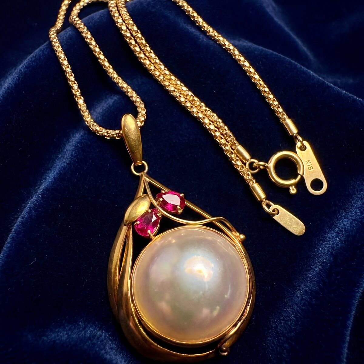 Mabe Pearl And Ruby Drop Pendant — photograph 2