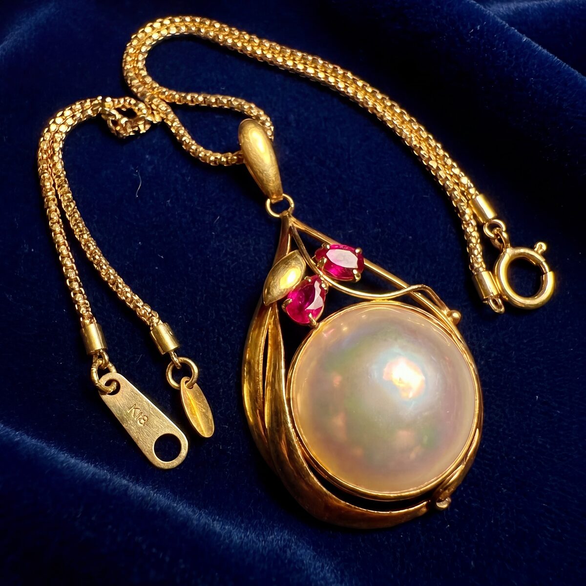 Mabe Pearl And Ruby Drop Pendant — photograph 3