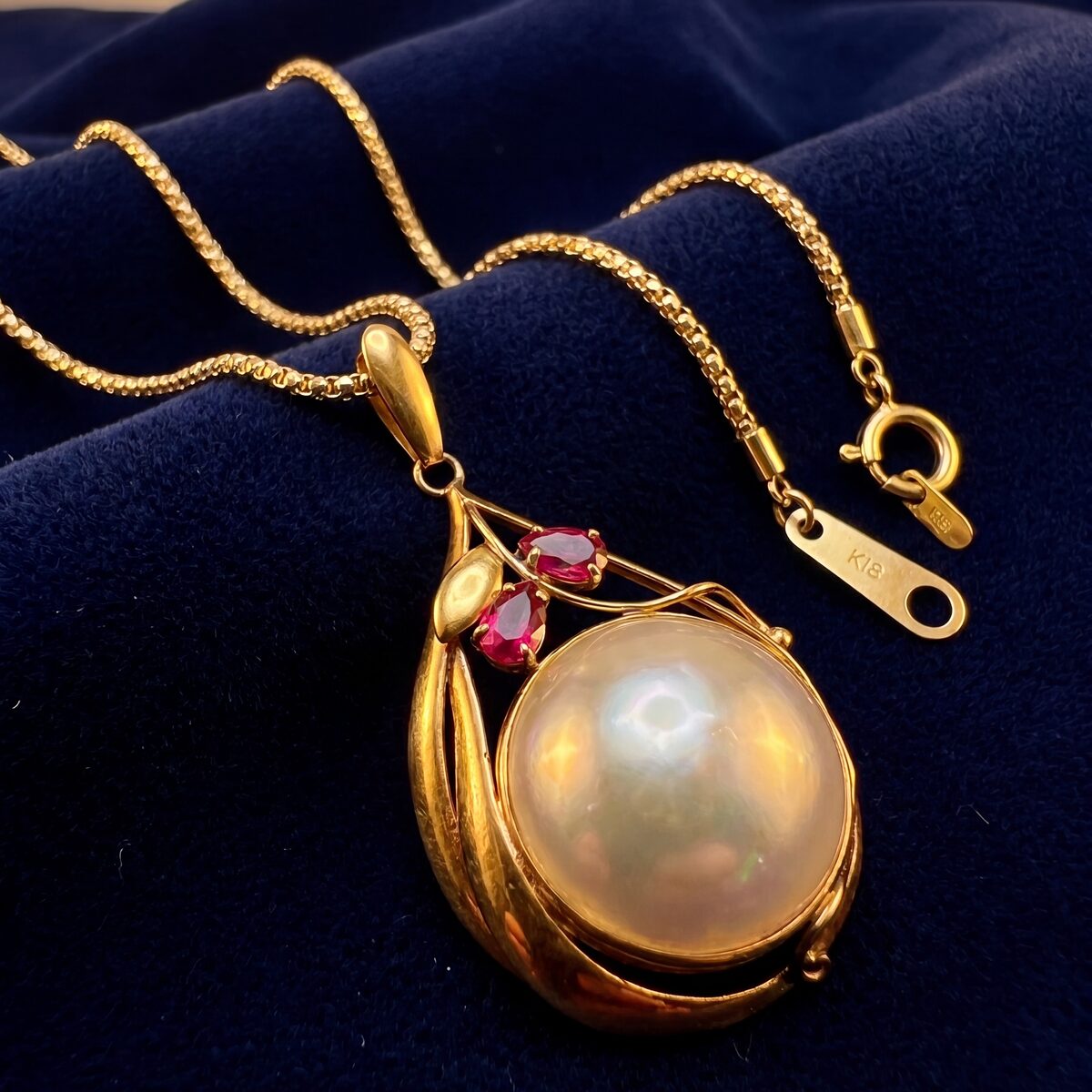 Mabe Pearl And Ruby Drop Pendant — photograph 4